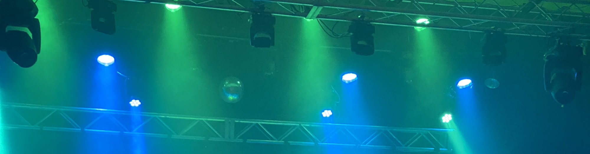 blue and green theater stage lights Greensboro